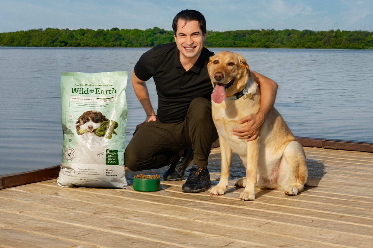 Ryan Bethencourt, founder of Wild Earth, with a dog.