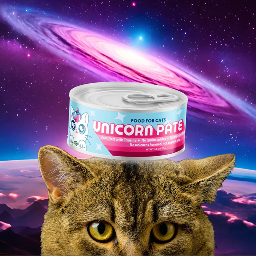 Can of Wild Earth 'Unicorn Pate' cat food placed on a cat with a space background. 