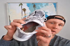 Customer give us  a review holding a white sneaker show our Red Aline All day .